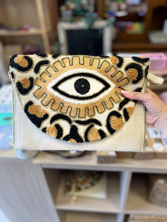 Pochette brodée Œil doré – Esprit bohème chic